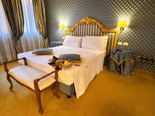 Postel nebo postele na pokoji v ubytování Hotel Corte Contarina