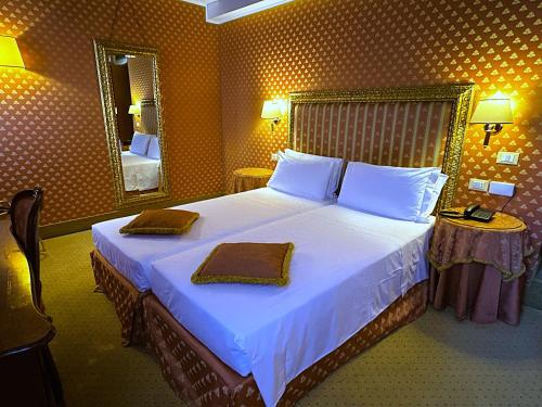Postel nebo postele na pokoji v ubytování Hotel Corte Contarina