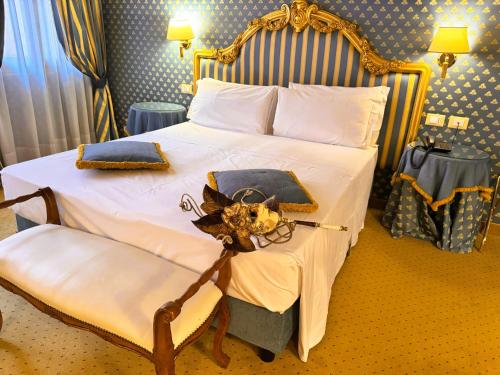 Postel nebo postele na pokoji v ubytování Hotel Corte Contarina