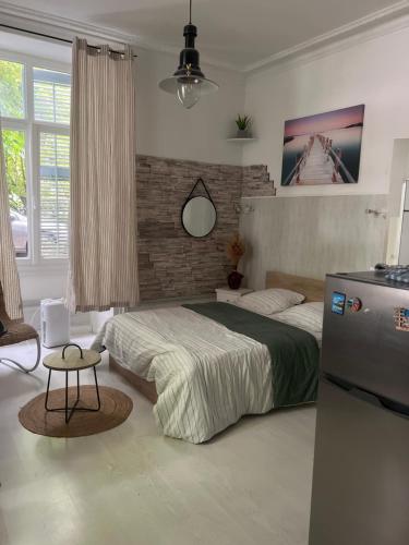Llit o llits en una habitació de Studio centre ville