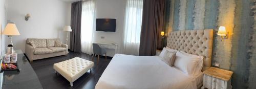 Viva Hotel Avellinoにあるベッド