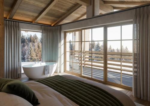 Giường trong phòng chung tại Chalet Zuegg