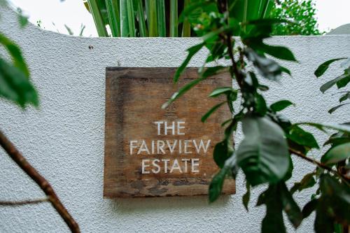 a sign on a wall that reads the railway estate at Viraam Estate by RÊVE in Assagao