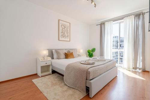 Bright Flat with Balcony & Garage by HostWise