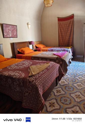 Postel nebo postele na pokoji v ubytování Scorpion House Luxor