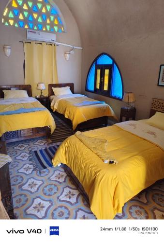 Postel nebo postele na pokoji v ubytování Scorpion House Luxor