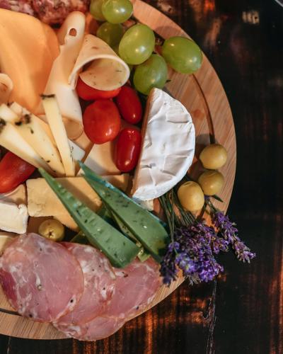 a plate of food with meat and vegetables on a table at Uroczysko Oleśnica in Chodzież