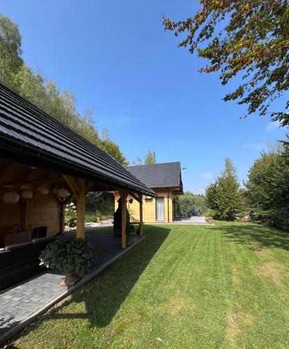 Κήπος έξω από το Drewniany Domek nad Doliną Dunajca