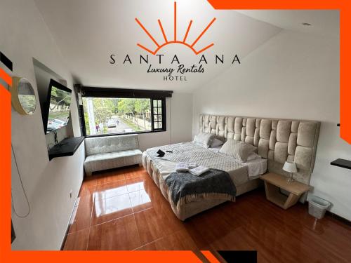 a bedroom with a bed and a couch at Hotel Santa Ana Luxury Rentals - 111 in Estación El Salto