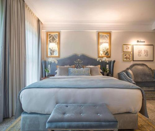 Кровать или кровати в номере Hotel Milano International Near Delhi Airport