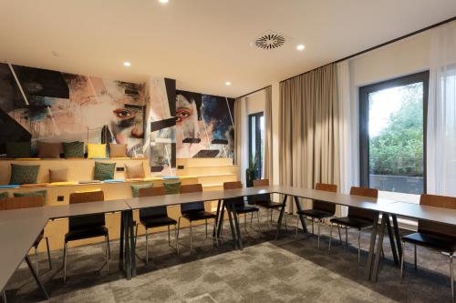 Et opholdsområde på Vienna House Easy by Wyndham Berlin Potsdamer Platz