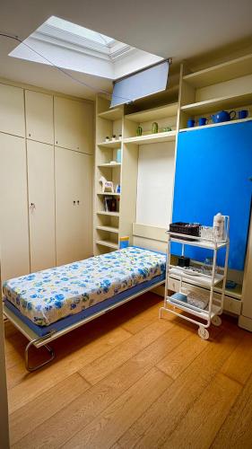 a small room with a bed in a room at Resort Dependance di Villa Rosa Maria in Savona