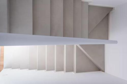a white shelf in a white room at Palm Villas in Manerba del Garda