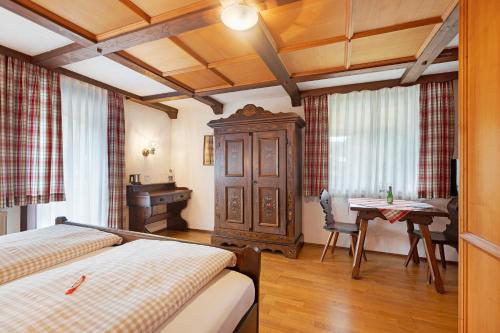 Postel nebo postele na pokoji v ubytování Gästehaus Löwen