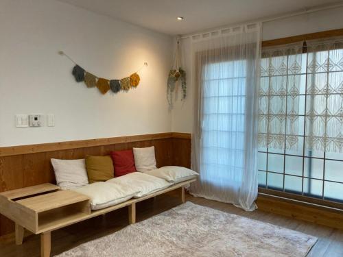 Postel nebo postele na pokoji v ubytování Lodam House