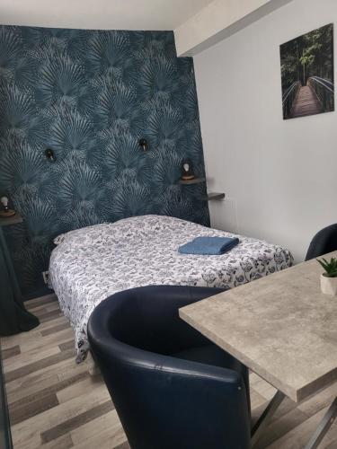 Voodi või voodid majutusasutuse Studio non fumeur en rez-de-chaussée toas