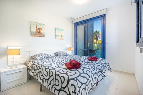 Katil atau katil-katil dalam bilik di Perfect Ground Floor with Sea View