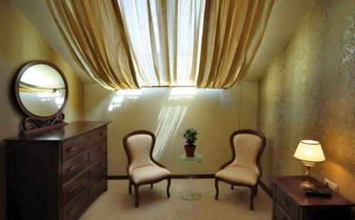 Un lugar para sentarse en Apart-Hotel Chale Graal