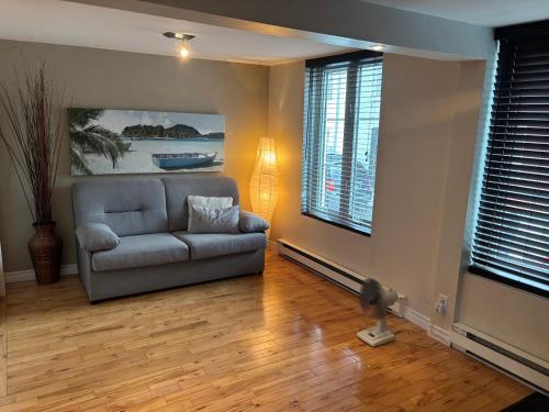 Χώρος καθιστικού στο Appartement Condo dans le vieux Québec