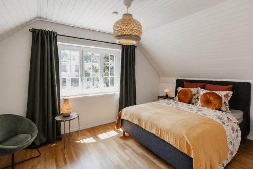 Una cama o camas en una habitación de Vogelbeer