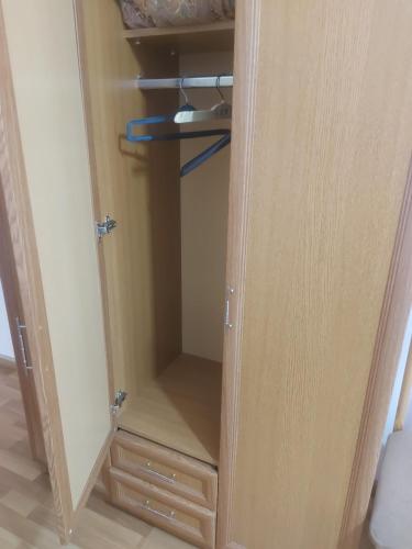 a cupboard with a door in a room at Kantegh Hotel in Ijevan