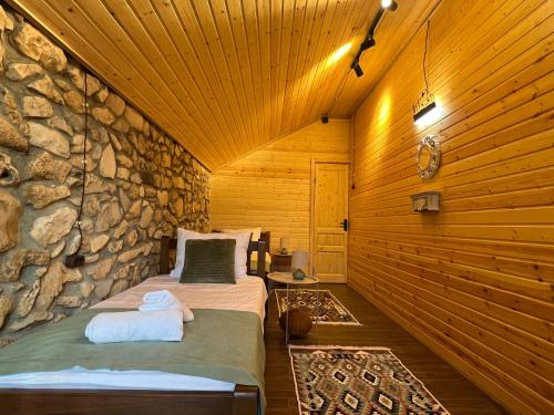 Ένα ή περισσότερα κρεβάτια σε δωμάτιο στο Villa Stone House