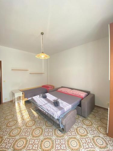 Ένα ή περισσότερα κρεβάτια σε δωμάτιο στο Casa Dina
