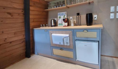 Køkken eller tekøkken på Chalé Valentina-Luxo com Hidromassagem