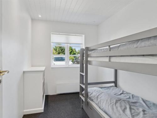 Ένα ή περισσότερα κρεβάτια σε δωμάτιο στο Holiday Home Thrym - 2-5km from the sea by Interhome