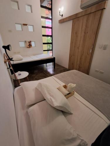 Ένα ή περισσότερα κρεβάτια σε δωμάτιο στο Imagine hostel