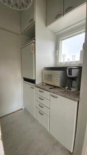 Dapur atau dapur kecil di Top-Floor Flat in Central Turku
