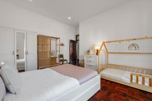 Cama o camas de una habitación en Rumo by KAAMAH