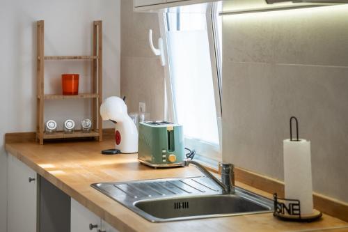 Una cocina o zona de cocina en Rumo by KAAMAH