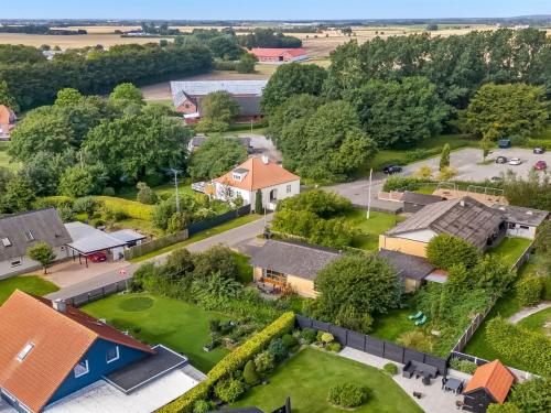 an aerial view of a village with houses and trees at Holiday Home Ilmo - 1-9km from the sea by Interhome in Aså
