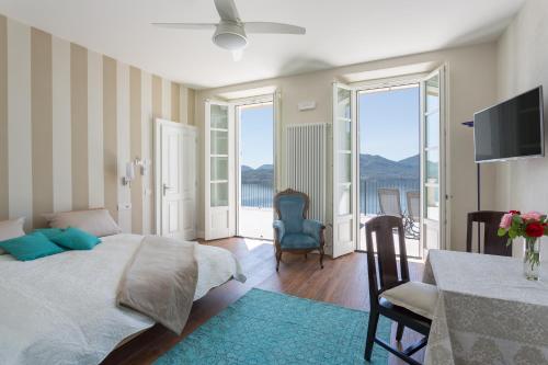 Ένα ή περισσότερα κρεβάτια σε δωμάτιο στο Villa Paradiso