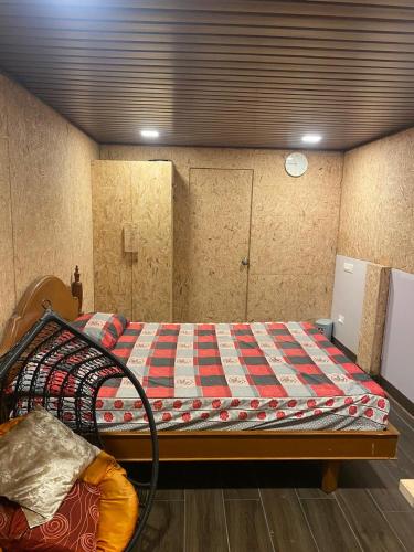 a bedroom with a bed in a room at View Point Stay in Yelagiri