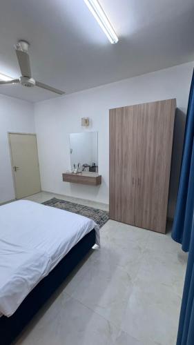 Postel nebo postele na pokoji v ubytování جناح الراحة فرق