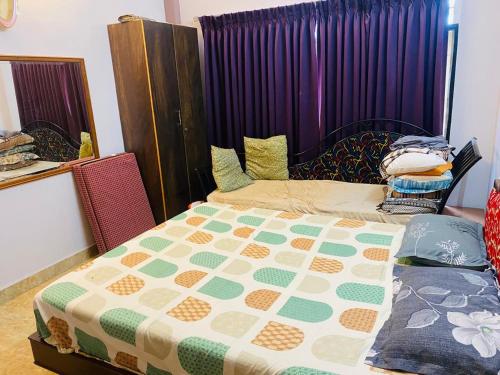 Comfort Homestayにあるベッド