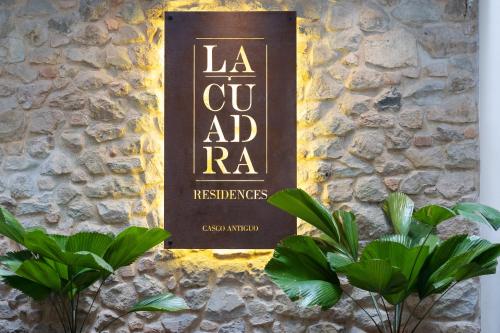 La Cuadra Apartments By Acomodoに飾ってある許可証、賞状、看板またはその他の書類