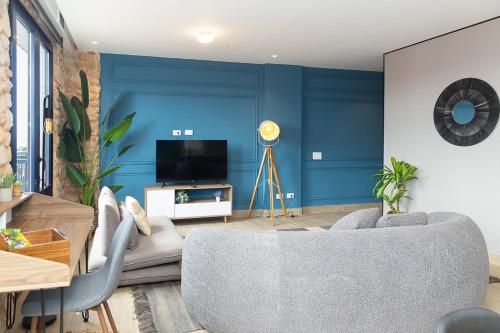 La Cuadra Apartments By Acomodoにあるテレビまたはエンターテインメントセンター