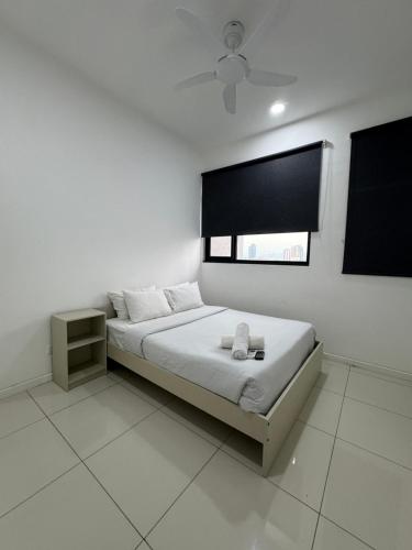 Postel nebo postele na pokoji v ubytování Chamber Premium Hospitality KLCC