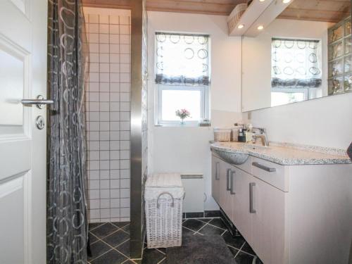 Koupelna v ubytování Holiday Home Grim - 5m from the sea by Interhome