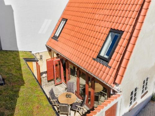 an overhead view of a house with an orange roof at Apartment Gaby - 250m from the sea by Interhome in Assens