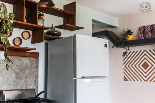 Dapur atau dapur kecil di Hostal Cuca Macuca
