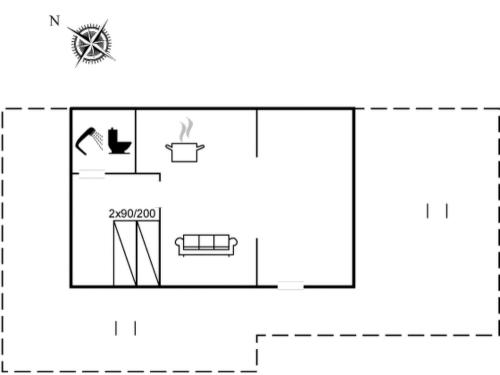 a floor plan of a house with a fireplace at Holiday Home Siouxsie - 500m from the sea by Interhome in Esbjerg