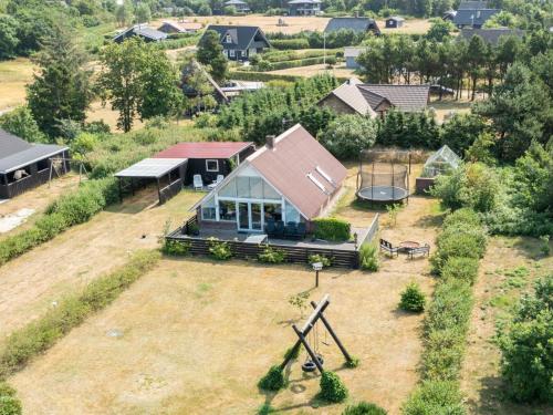 an aerial view of a house with a yard at Holiday Home Gizella - 850m to the fjord by Interhome in Skjern