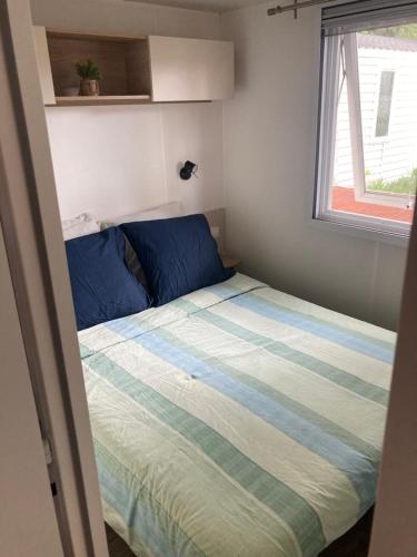 Ένα ή περισσότερα κρεβάτια σε δωμάτιο στο Camping Siblu