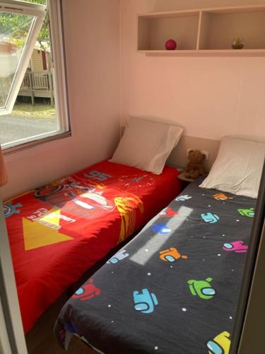 Ένα ή περισσότερα κρεβάτια σε δωμάτιο στο Camping Siblu