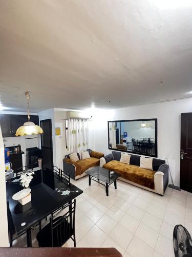 Un lugar para sentarse en Cozy Home in Lapu-Lapu