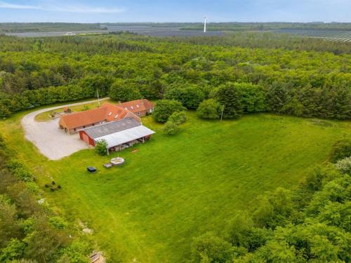 an aerial view of a house in a field at Holiday Home Wilmar - 1km to the fjord by Interhome in Vemb